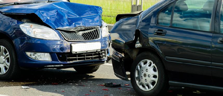 Rear-End Collision Between Dark Blue and Black Cars on Detroit Outskirts