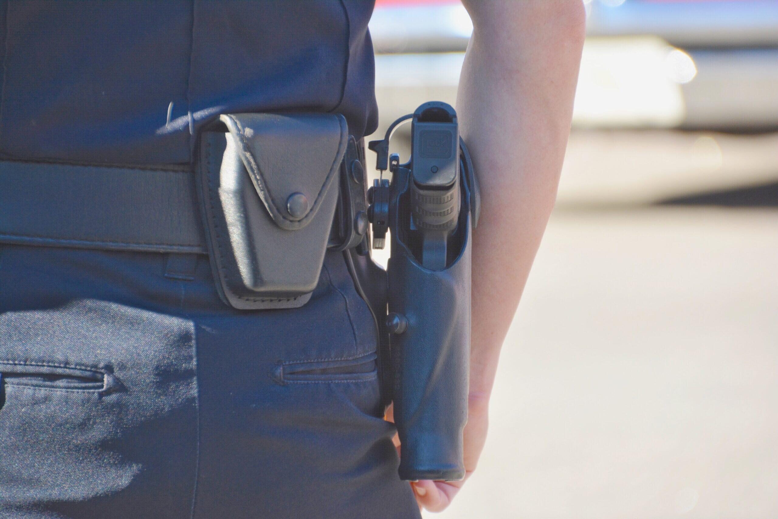 Law enforcement officer preparing to serve a warrant